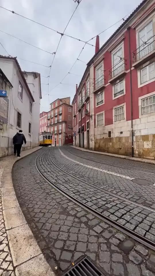 Tram 28 on a cobbled street