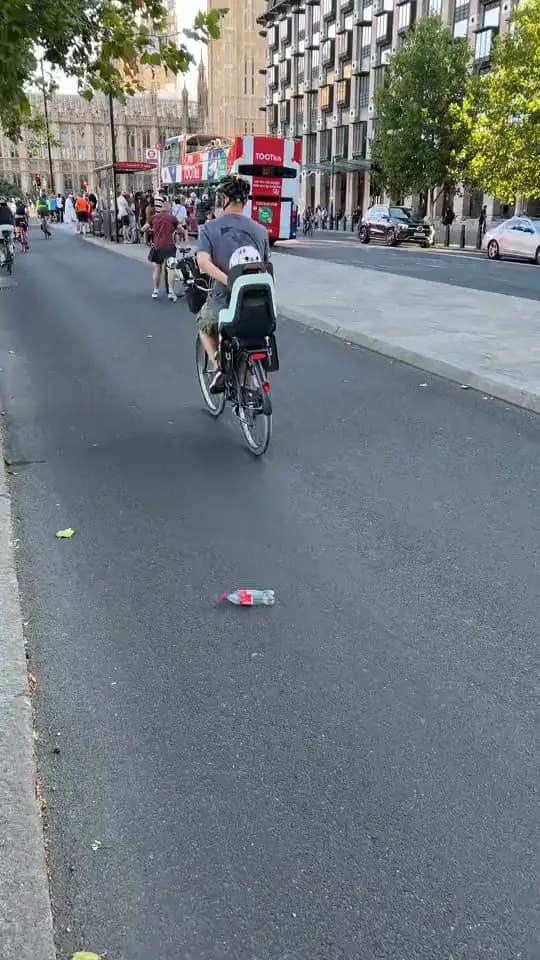 Cyclists with Big Ben behind